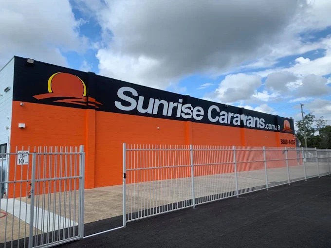 Sunrise Caravans building and gated caravan yard in Burpengary QLD